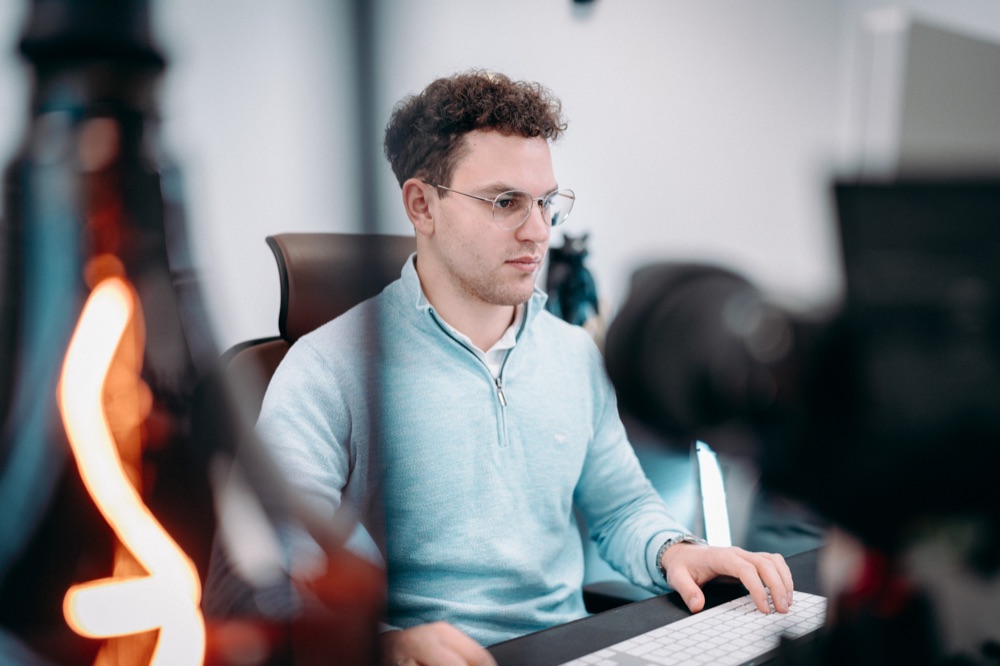Nikita Yatsun working at his desk